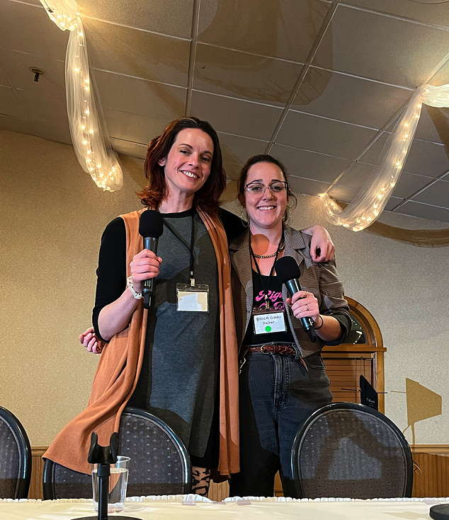 Savannah Sly and Becca Cleary pose for a photo after their panel at the New England Sex Work Summit (NESWS).