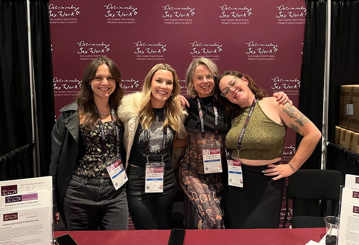 From left to right, DSW Executive Assistant Maddy Kammeraad-Campbell, Development Manager Esme Bengtson, Chief Advocacy Coordinator Henri Bynx, and Staff Attorney Becca Cleary pose at DSW’s booth at the AVN expo.