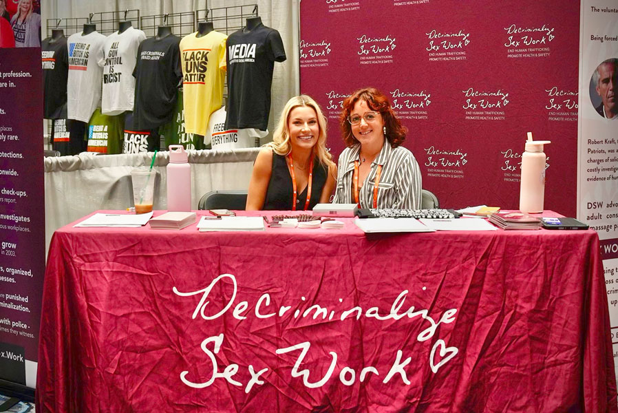 DSW Staff Attorney Becca Cleary and Development Manager Esmé Bengtson at the Decriminalize Sex Work booth at FreedomFest