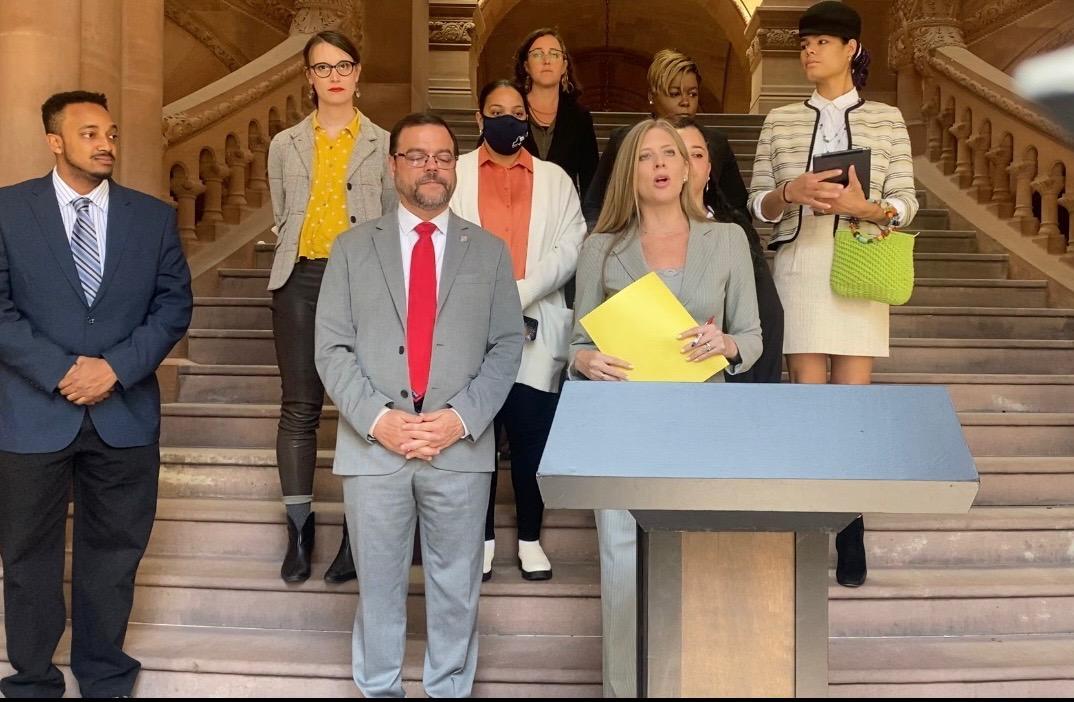 DSW's Melissa Broudo and Senate Sponsor Jose Sepulveda address advocate for immunity legislation during a press conference in 2022.