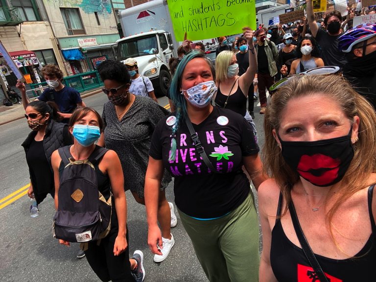 DSW’s J. Leigh Brantly, Frances Steele, and Melissa Broudo (left to right) march for Black lives in NYC. (Photo: DSW, 2020)