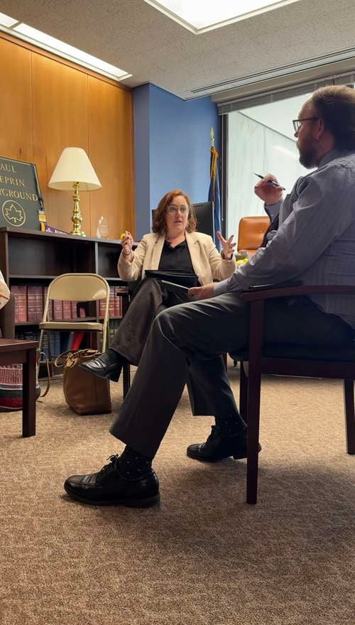DSW Staff Attorney Becca Cleary takes a meeting with a legislative staff member.