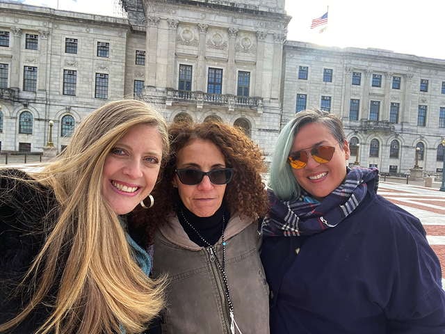 Melissa Broudo, Allison Kollins, and J. Leigh Oshiro-Brantly pose in the capital shortly before the meeting begins. (DSW, 2021)